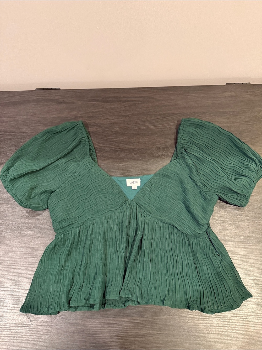 Lush Green Crinkle Peplum Top by Lane 201